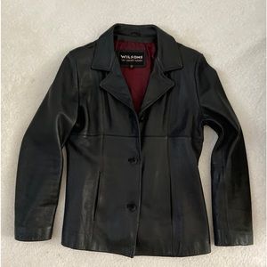 Wilson’s genuine leather… vintage… like new … no worn spots!